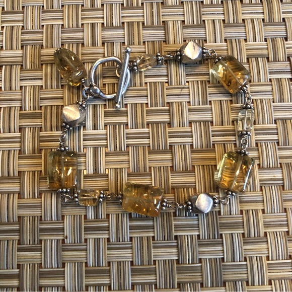 Simply Stunning  amber coloured bracelet with silver bead accents in between - Picture 7 of 13